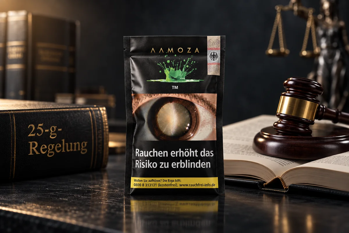 Versiegelte AAMOZA 25 g Packung mit Steuerzeichen vor Gesetzbuch, Richterhammer und Waage der Justitia